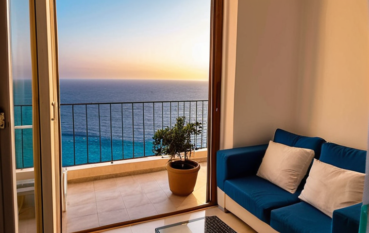 **
A cozy apartment interior in Sliema, Malta. Balcony overlooking the Mediterranean Sea. Modern furniture, warm lighting. Focus on a budget-friendly living space, reflecting affordable housing options in Malta.
**